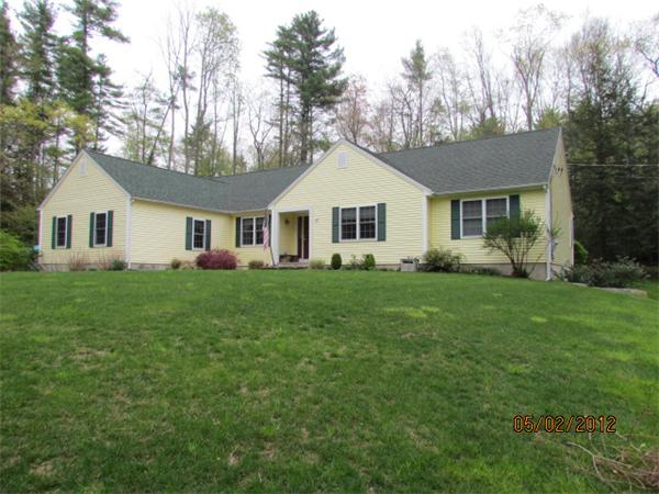 402 New Boston Road Sturbridge, MA 01566 - Photo 1 of 16 a front view of house with yard and green space
