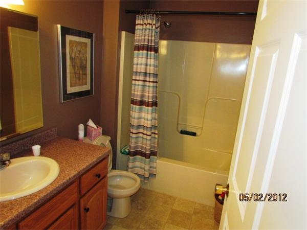 402 New Boston Road Sturbridge, MA 01566 - Photo 13 of 16 a bathroom with a granite countertop sink toilet and shower