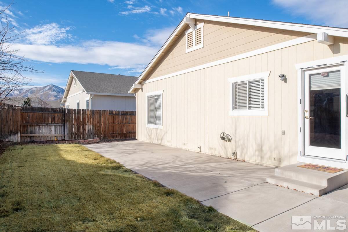 7764 Tulear Street Reno, NV 89506 - Photo 16 of 21 a backyard of a house
