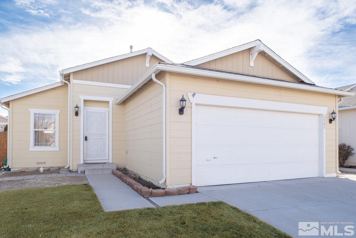 7764 Tulear Street Reno, NV 89506 - Photo 2 of 21 a view of a house with a yard
