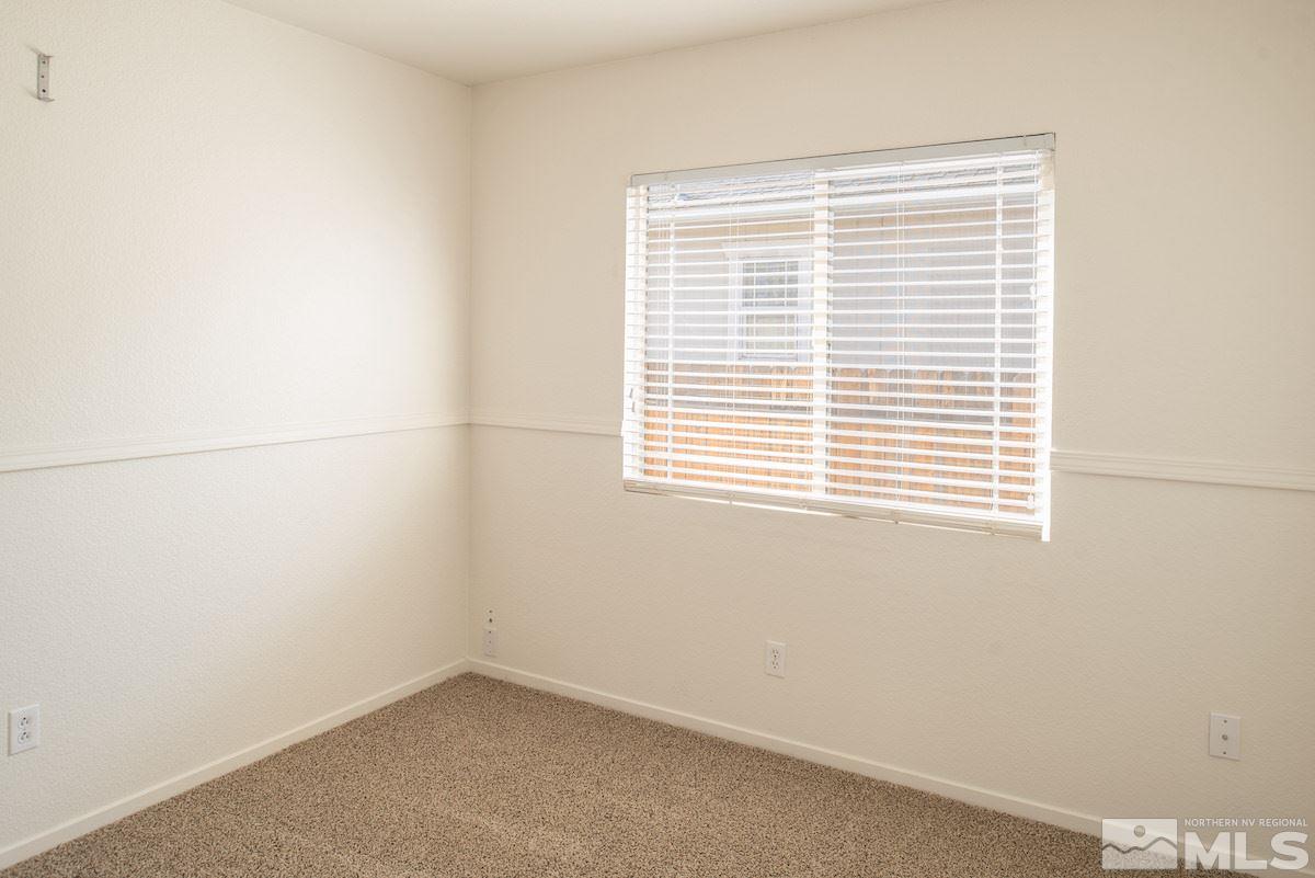 7764 Tulear Street Reno, NV 89506 - Photo 9 of 21 a view of a small space with a window