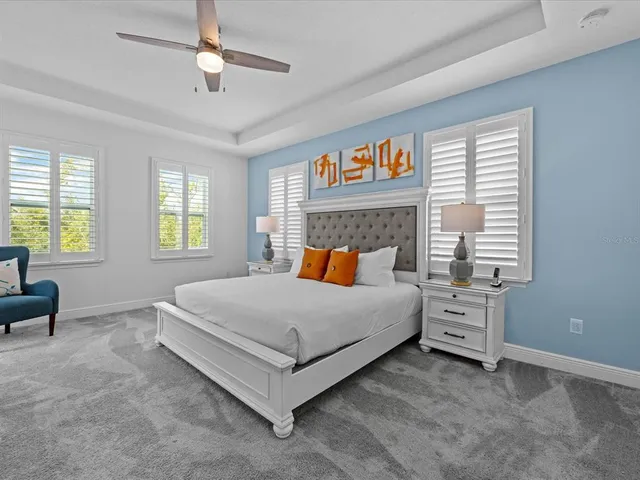 a bathroom with a granite countertop sink mirror and double