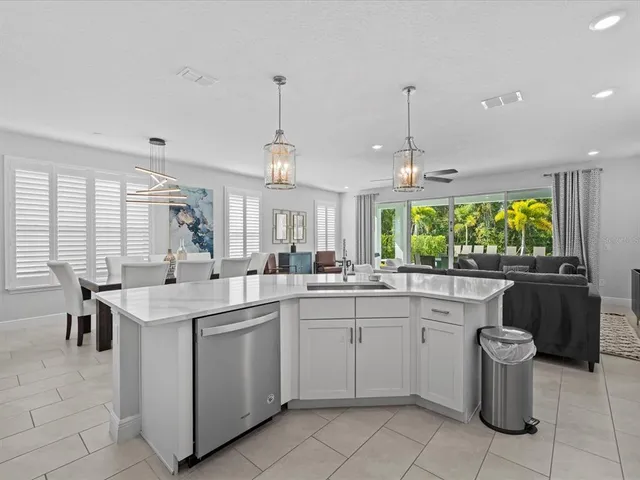 a bedroom with a bed and a table in it