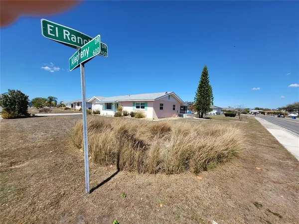 a front view of a house with garage