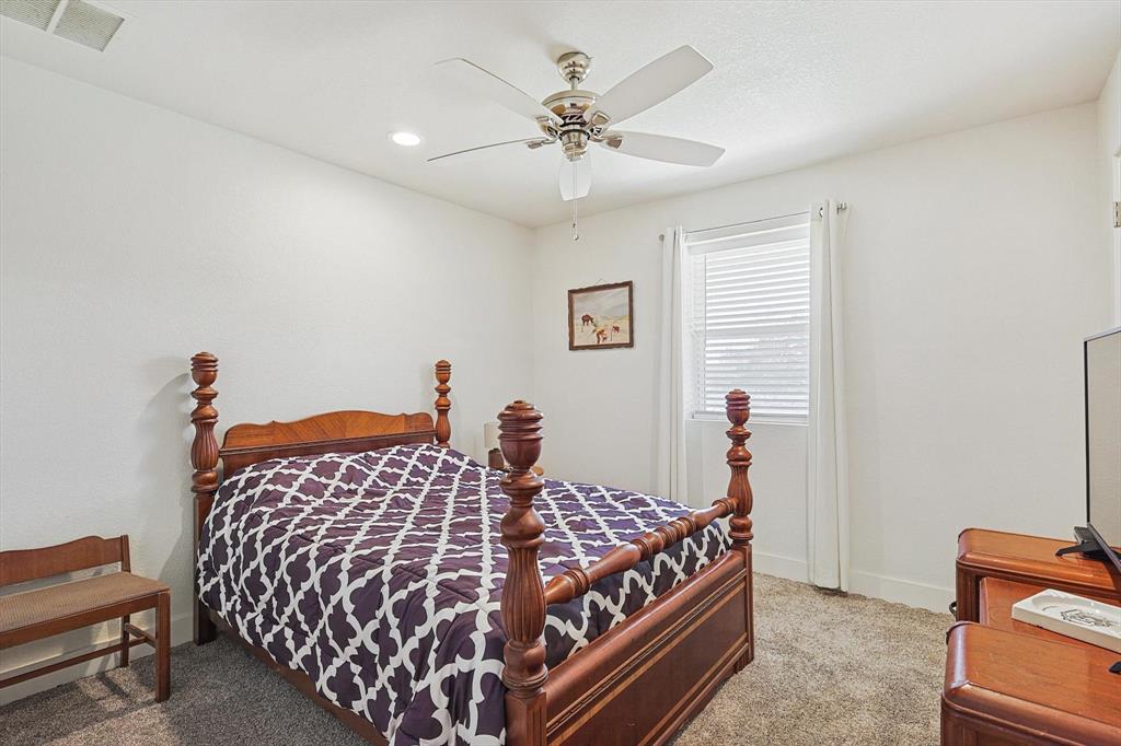 1161 Lynn Creek Road Jacksboro, TX 76458 - Photo 21 of 40 Bedroom with carpet flooring and ceiling fan