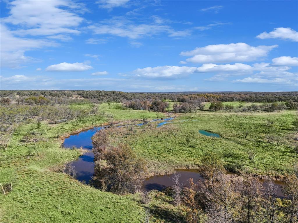 1161 Lynn Creek Road Jacksboro, TX 76458 - Photo 38 of 40 Drone / aerial view featuring a water view