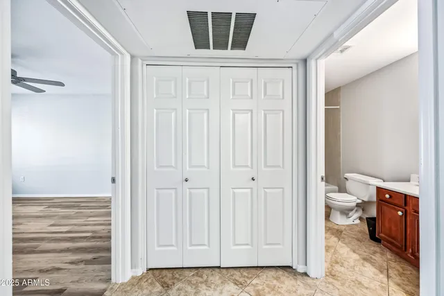 a view of an empty room and window