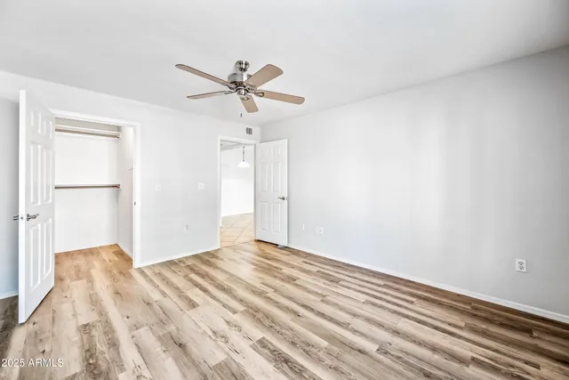 a view of an empty walk in closet