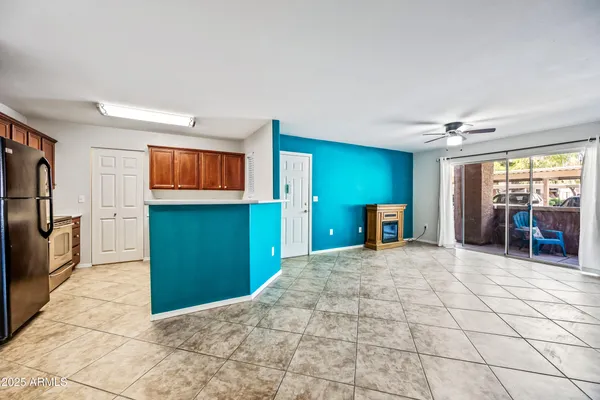 a kitchen with a sink a cabinets and window