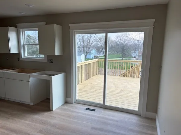 a view of a utility room and window in a room