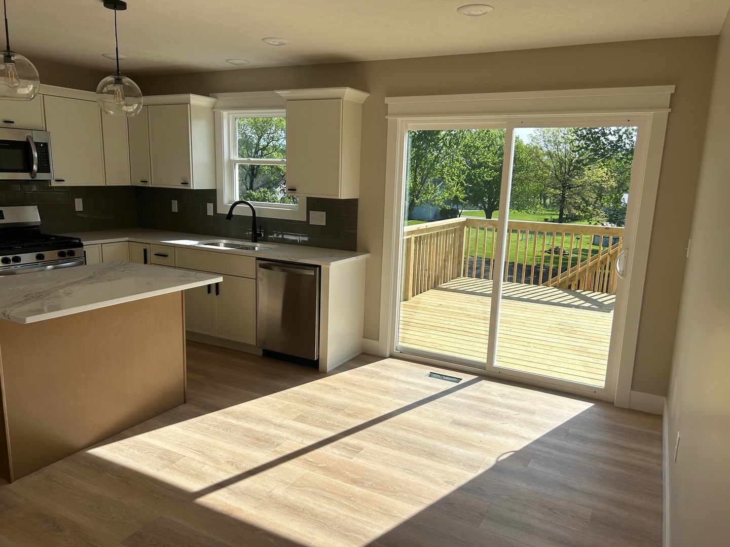 25179 North 2175 East Road Lexington, IL 61753 - Photo 6 of 23 a kitchen with a sink and wooden floor