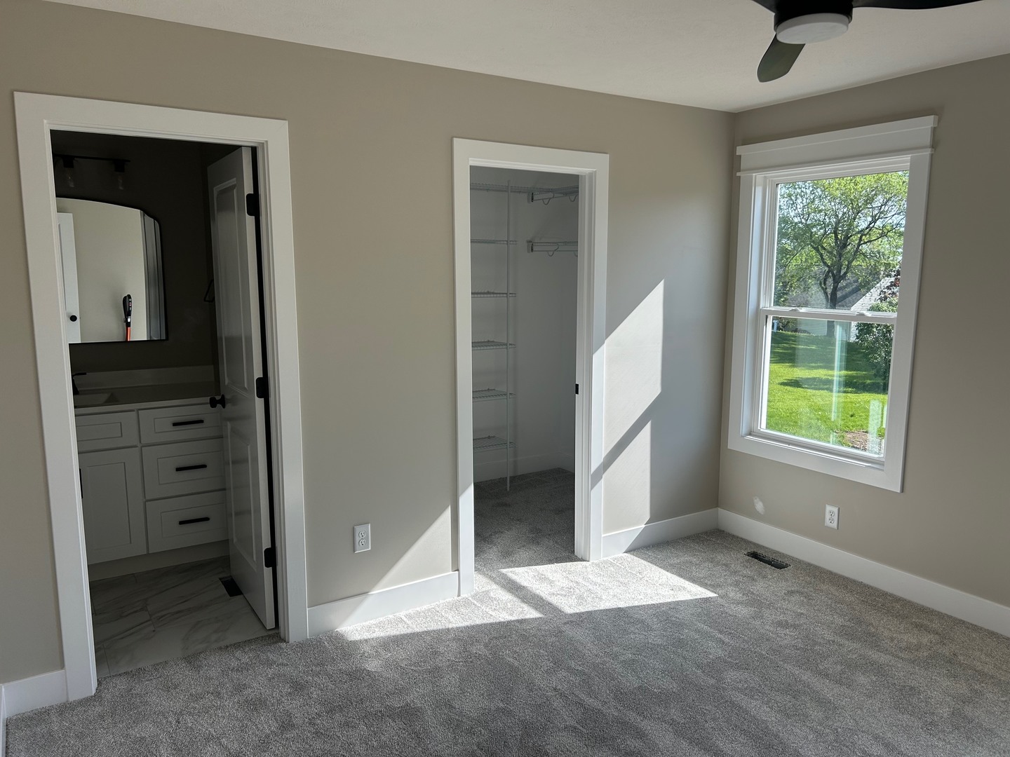 25179 North 2175 East Road Lexington, IL 61753 - Photo 7 of 23 a view of an empty room with a window and closet