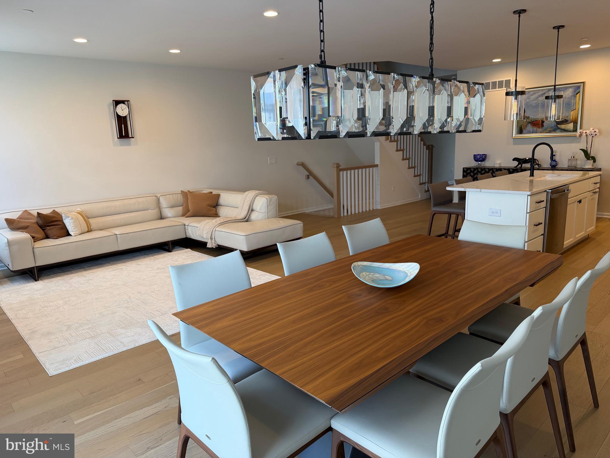 12 Spring Mill Drive Ivyland, PA 18974 - Photo 11 of 25 a kitchen with a table chairs and flat screen