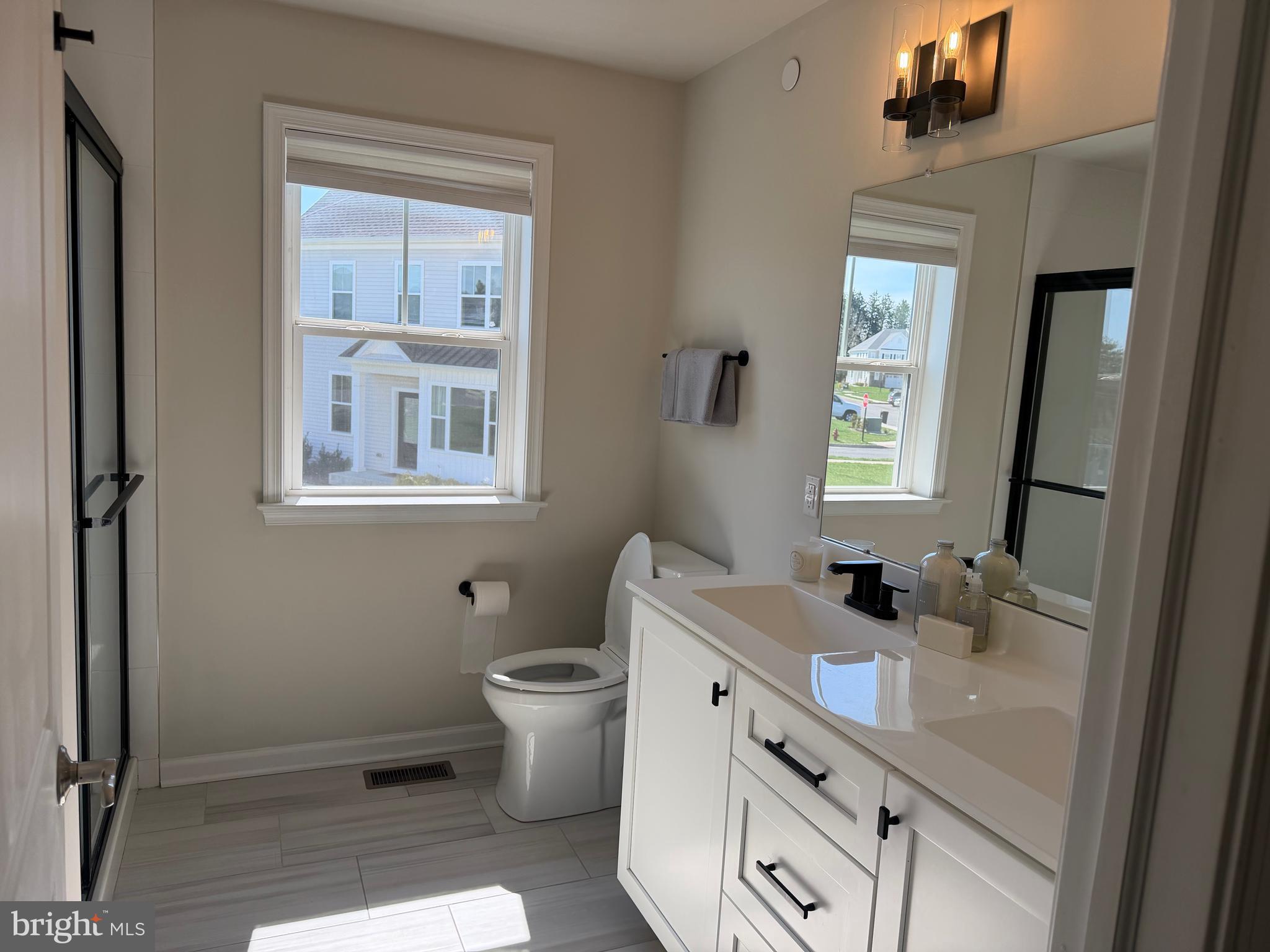 12 Spring Mill Drive Ivyland, PA 18974 - Photo 14 of 25 a bathroom with a sink toilet and mirror