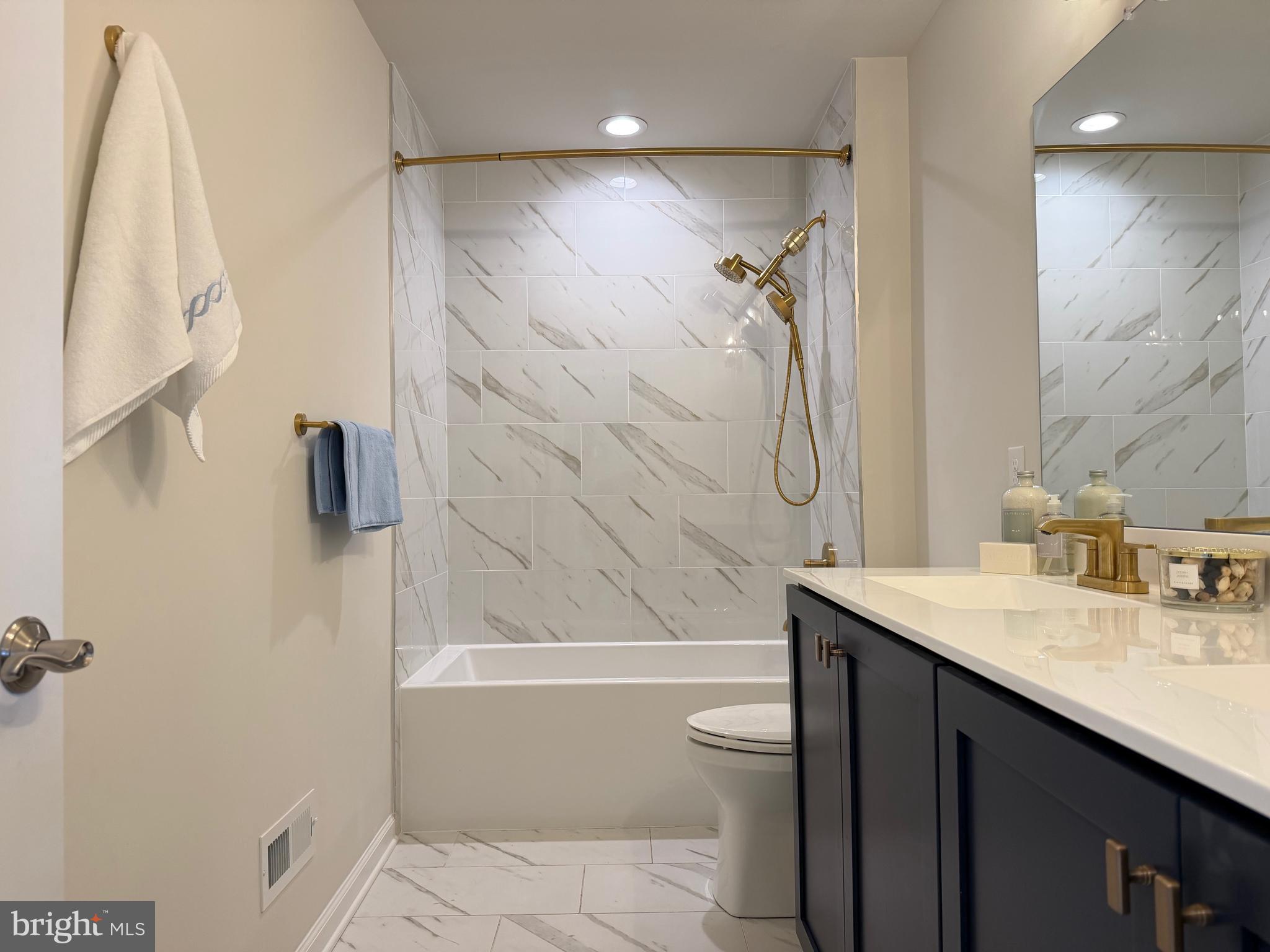 12 Spring Mill Drive Ivyland, PA 18974 - Photo 19 of 25 a bathroom with a sink a toilet and shower