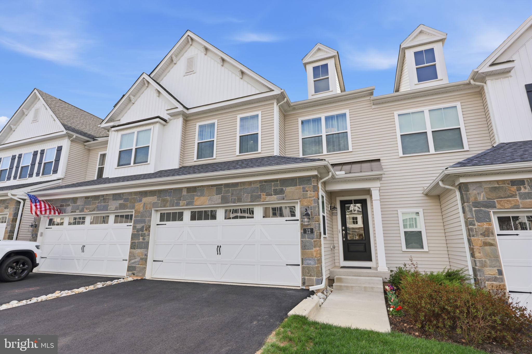 12 Spring Mill Drive Ivyland, PA 18974 - Photo 2 of 25 front view of a house with a yard