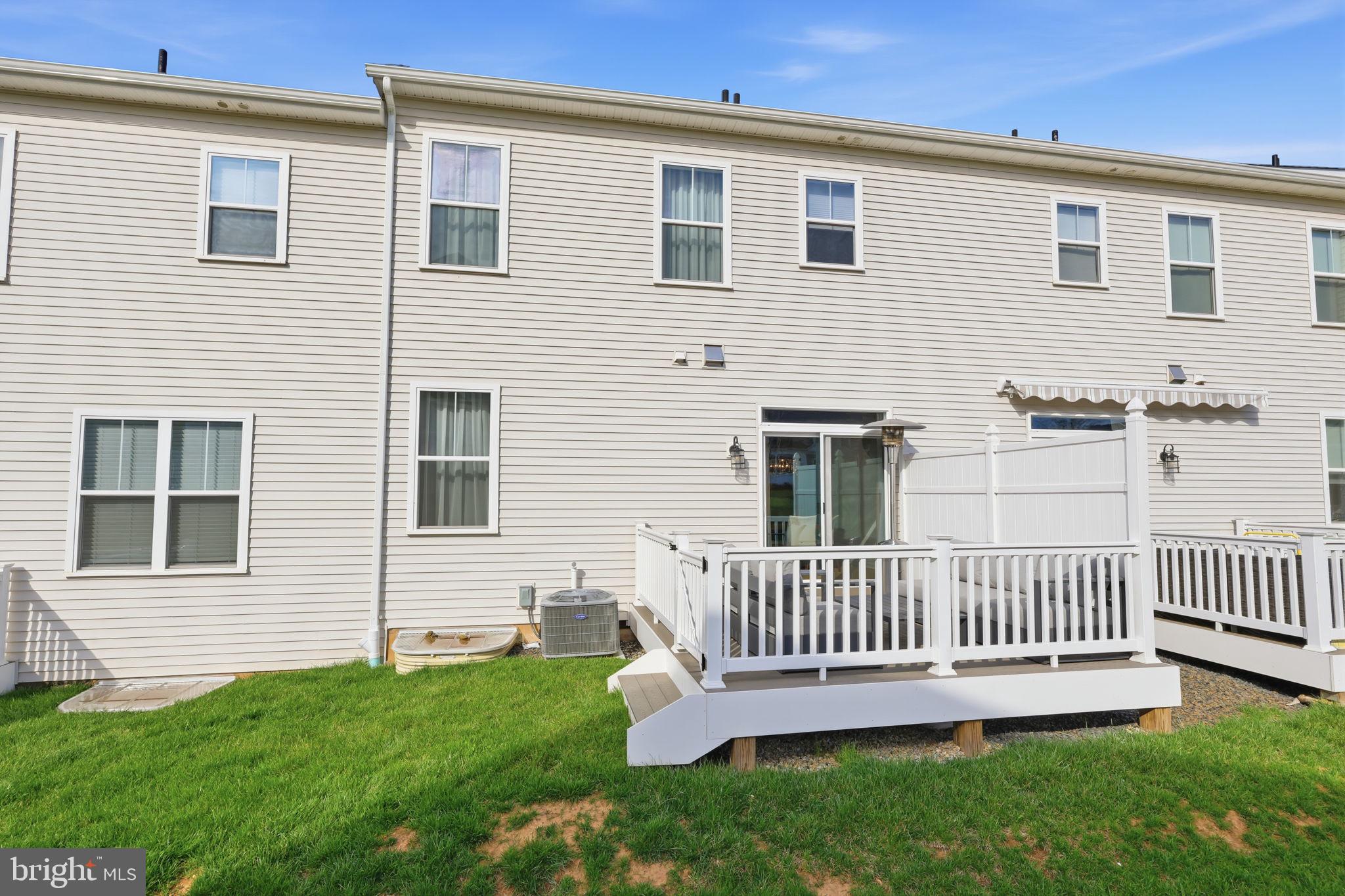 12 Spring Mill Drive Ivyland, PA 18974 - Photo 23 of 25 a view of a house with a backyard and deck