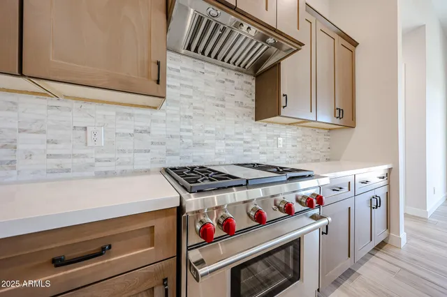 a view of room with wooden floor