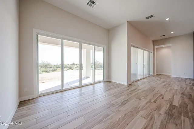 an empty room with windows