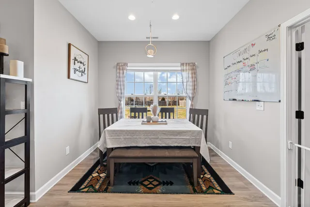 a view of a livingroom with furniture and window