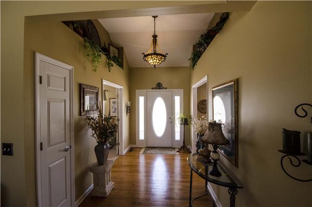 981 Rip Steele Road Columbia, TN 38401 - Photo 3 of 20 Front door entryway w/ hardwood flooring; lots of closets; decorative shelving!