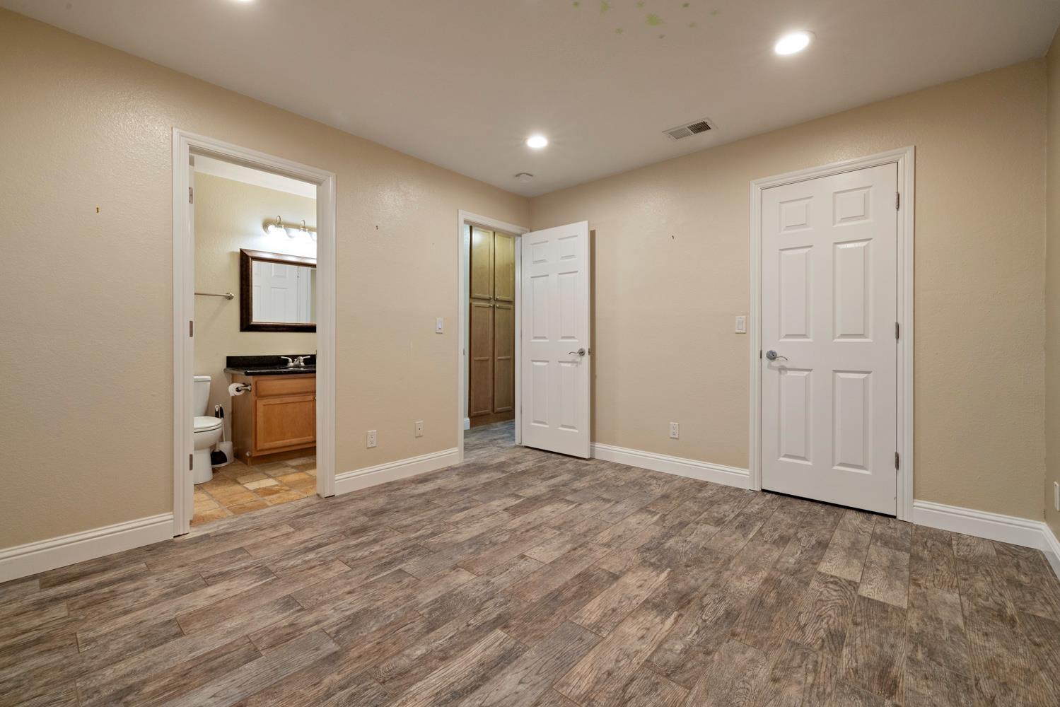 3901 Dale Road, Unit A Modesto, CA 95356 - Photo 14 of 23 a view of empty room with wooden floor