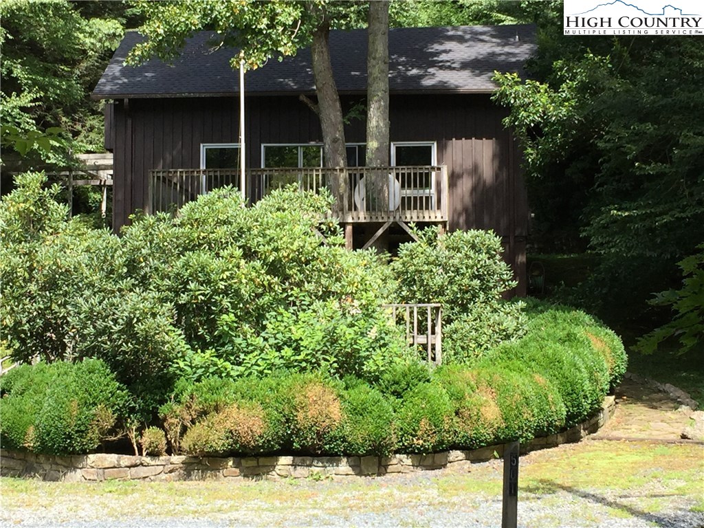 501 Rocky Creek Road Boone, NC 28607 - Photo 1 of 1 a front view of a house with garden