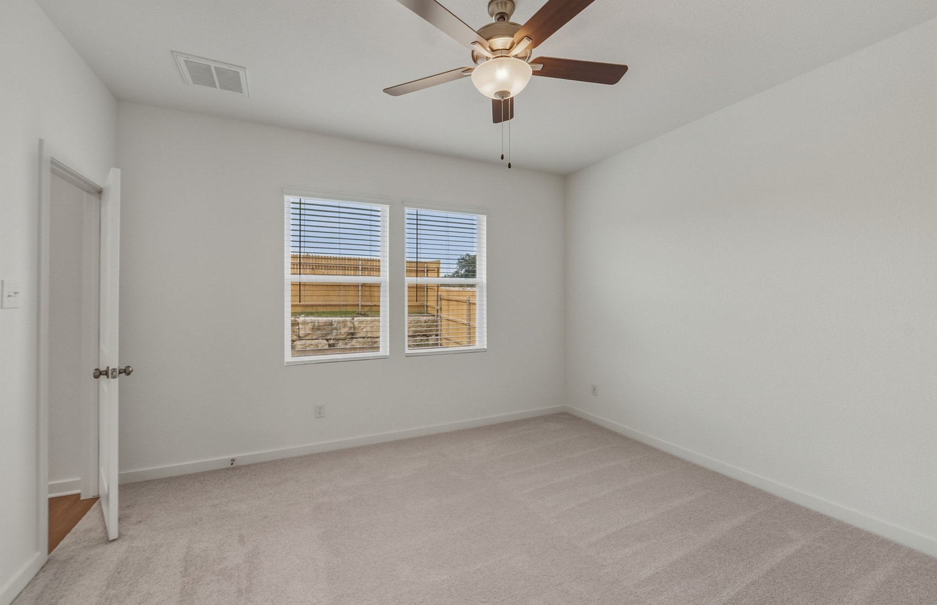 3019 Titus Court Temple, TX 76501 - Photo 11 of 29 an empty room with a window and a fan