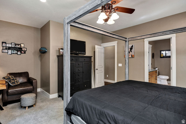 288 525 South Providence, UT 84332 - Photo 17 of 71 Spacious bedroom featuring neutral wall tones, recessed lighting, and a ceiling fan with integrated lighting