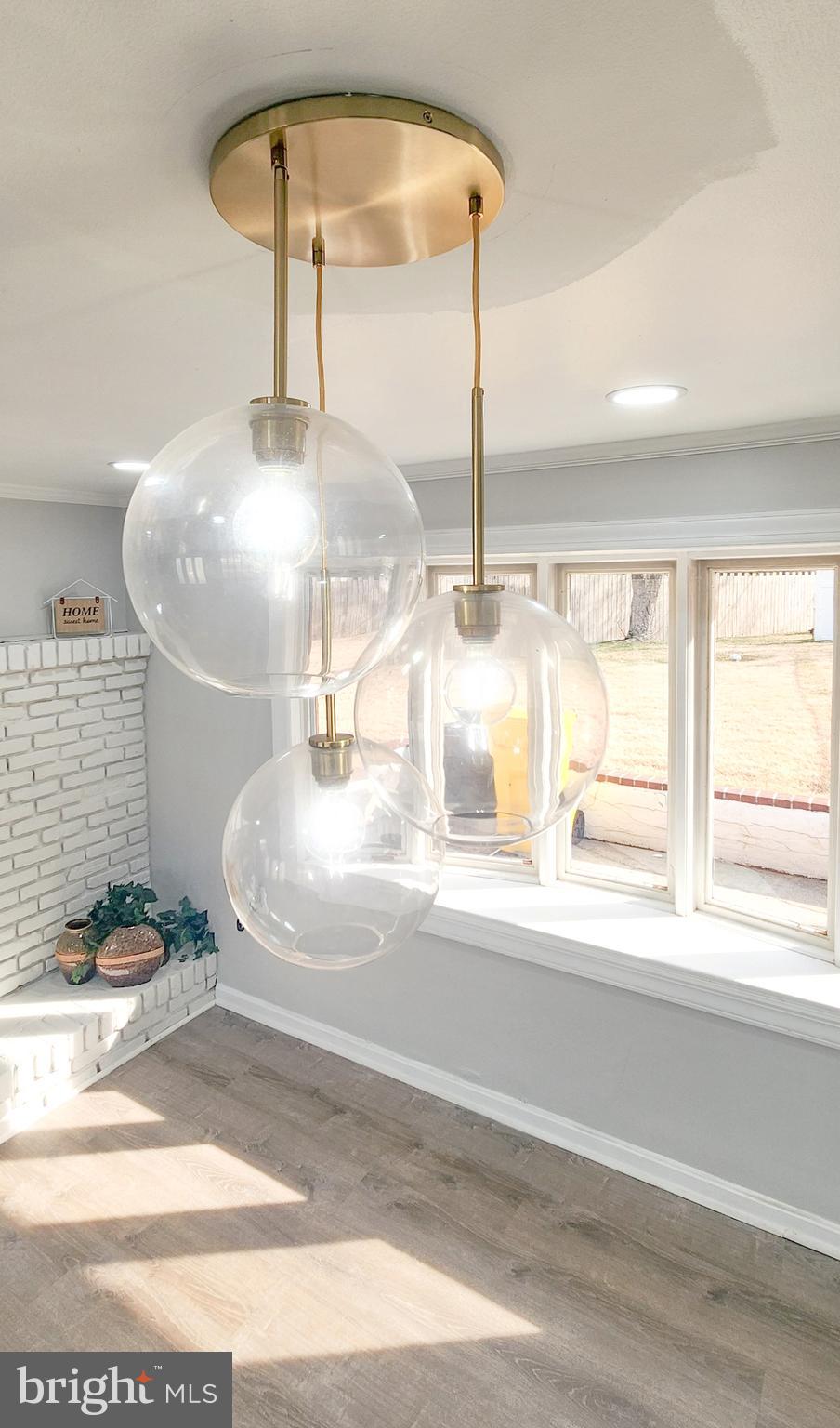 907 Reece Road Severn, MD 21144 - Photo 12 of 56 a water heater sitting next to a window