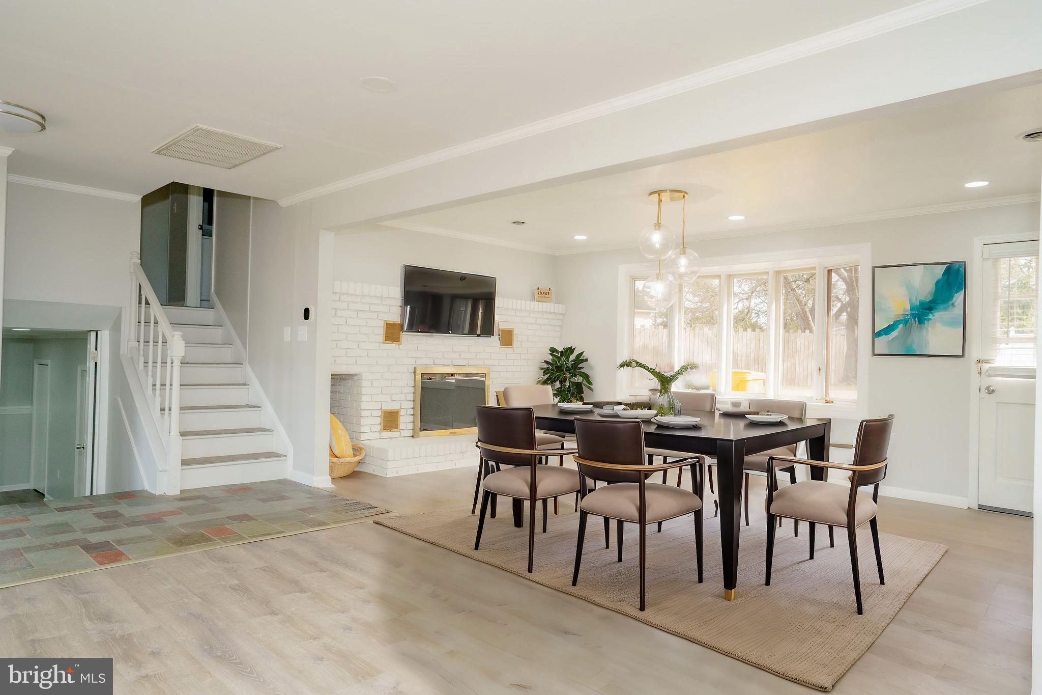 907 Reece Road Severn, MD 21144 - Photo 15 of 56 a view of a dining room with furniture