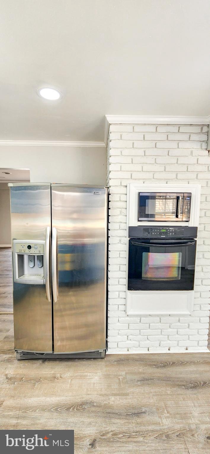 907 Reece Road Severn, MD 21144 - Photo 19 of 56 a view of a fireplace in the room