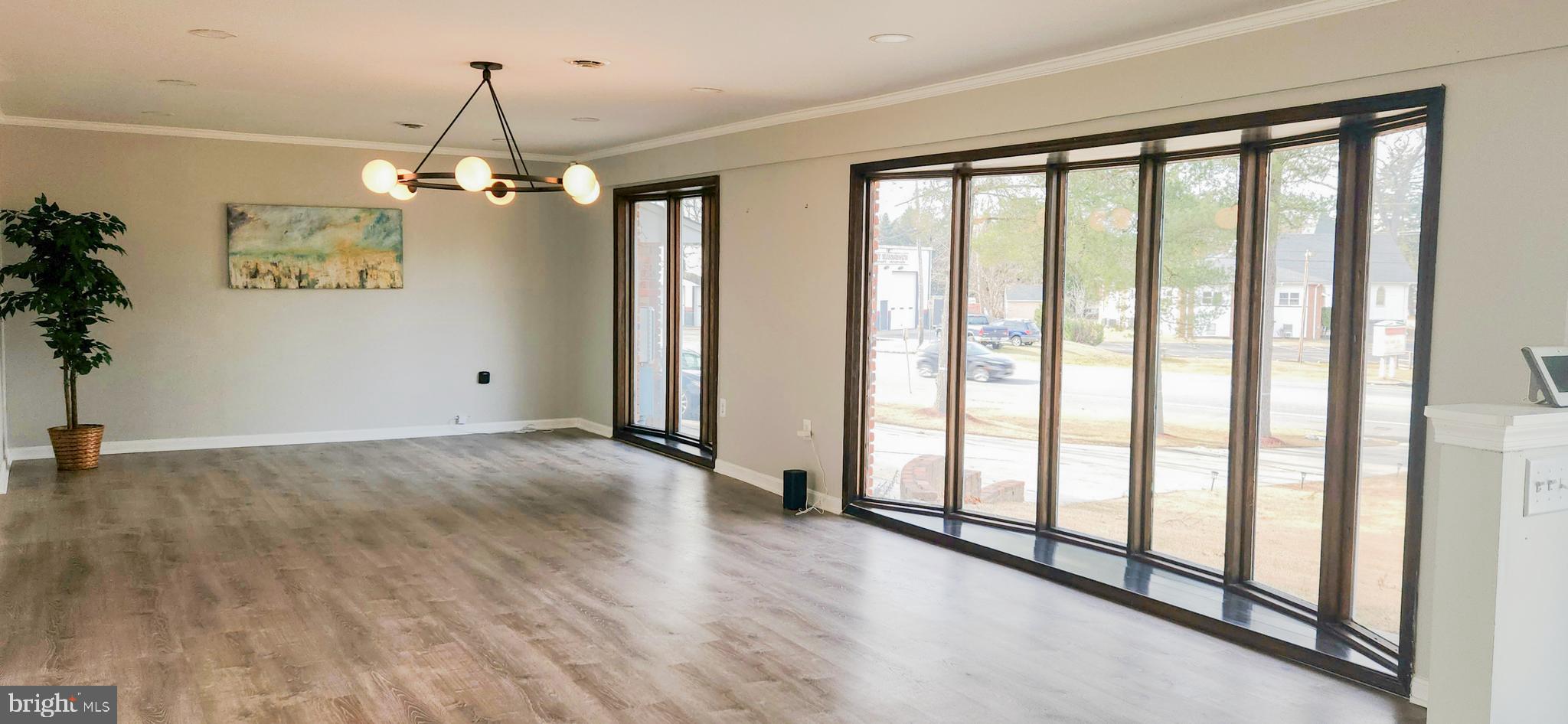907 Reece Road Severn, MD 21144 - Photo 8 of 56 a view of a room with wooden floor