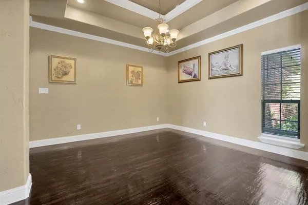 a view of an entryway with a chandelier
