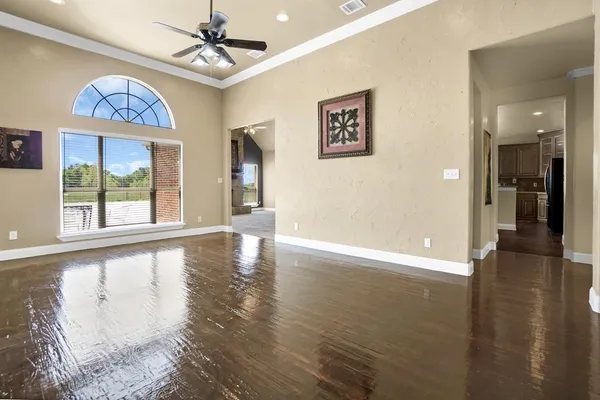 a view of a livingroom with wooden floor