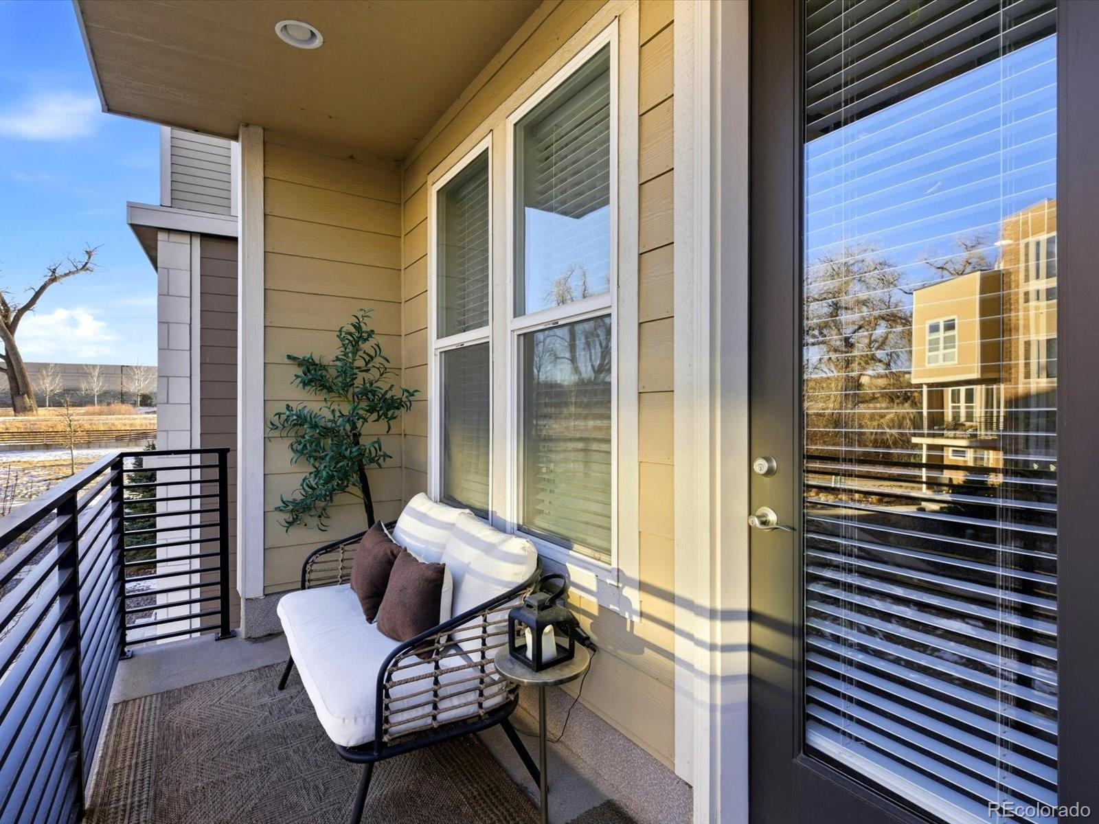8338 Rivulet Point Highlands Ranch, CO 80129 - Photo 23 of 50 a view of a balcony with chairs