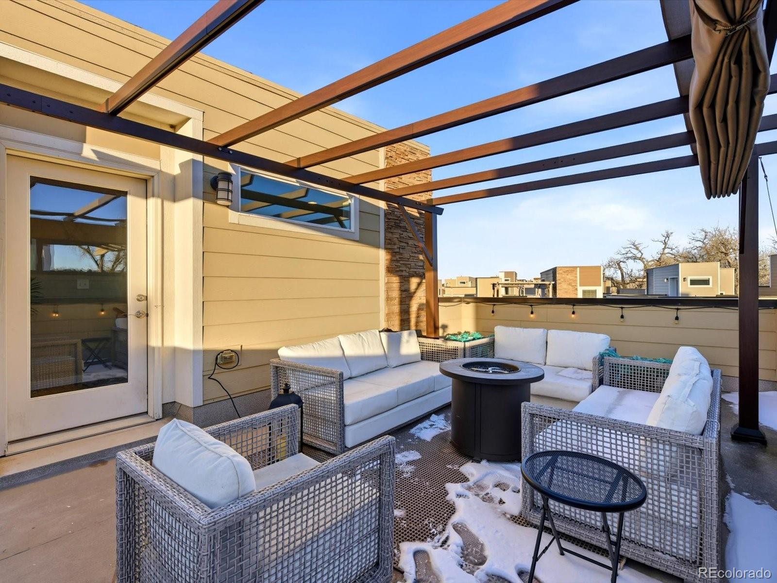 8338 Rivulet Point Highlands Ranch, CO 80129 - Photo 40 of 50 a building outdoor space with patio furniture