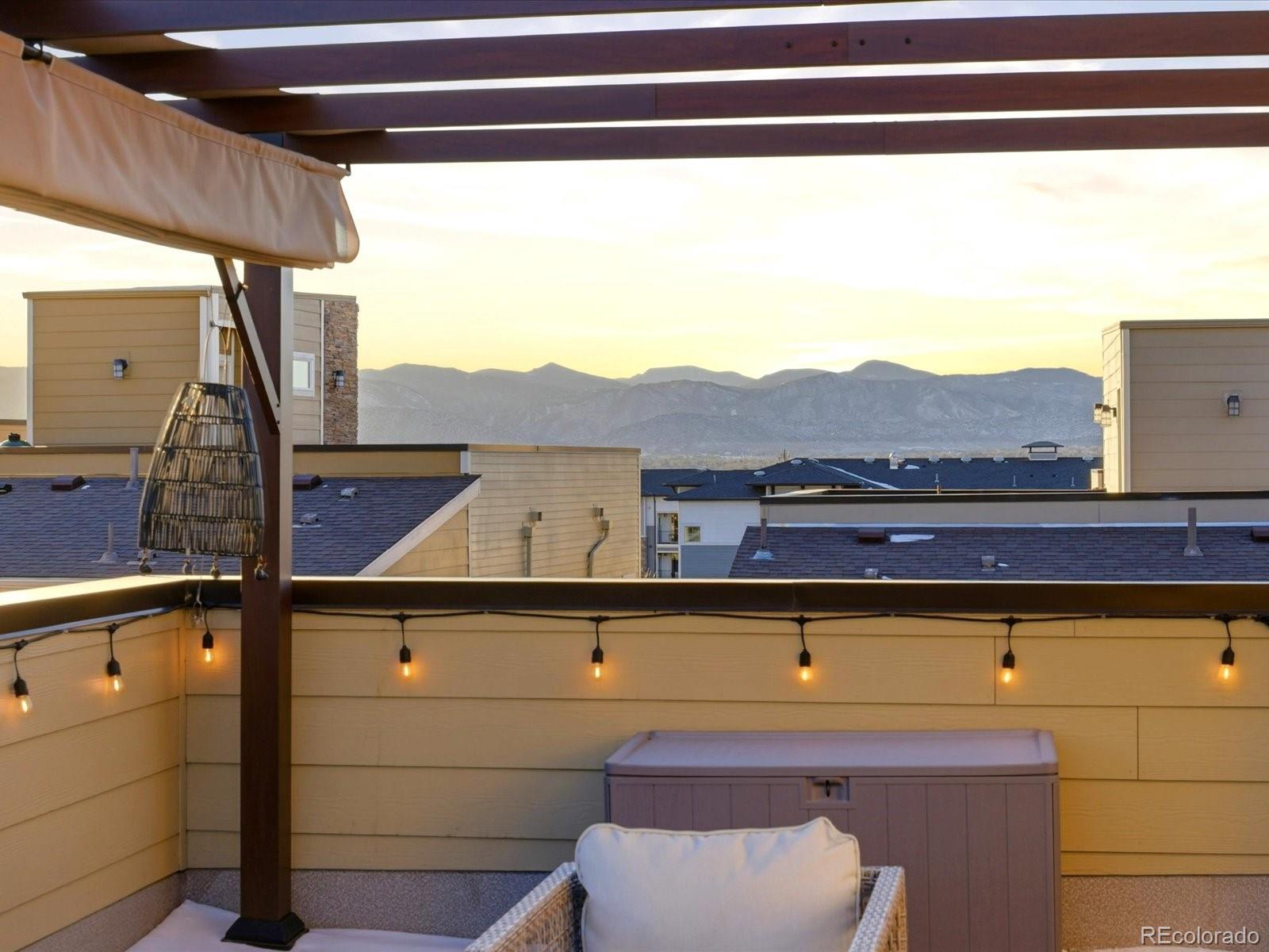 8338 Rivulet Point Highlands Ranch, CO 80129 - Photo 43 of 50 a view of a room with a table and chairs