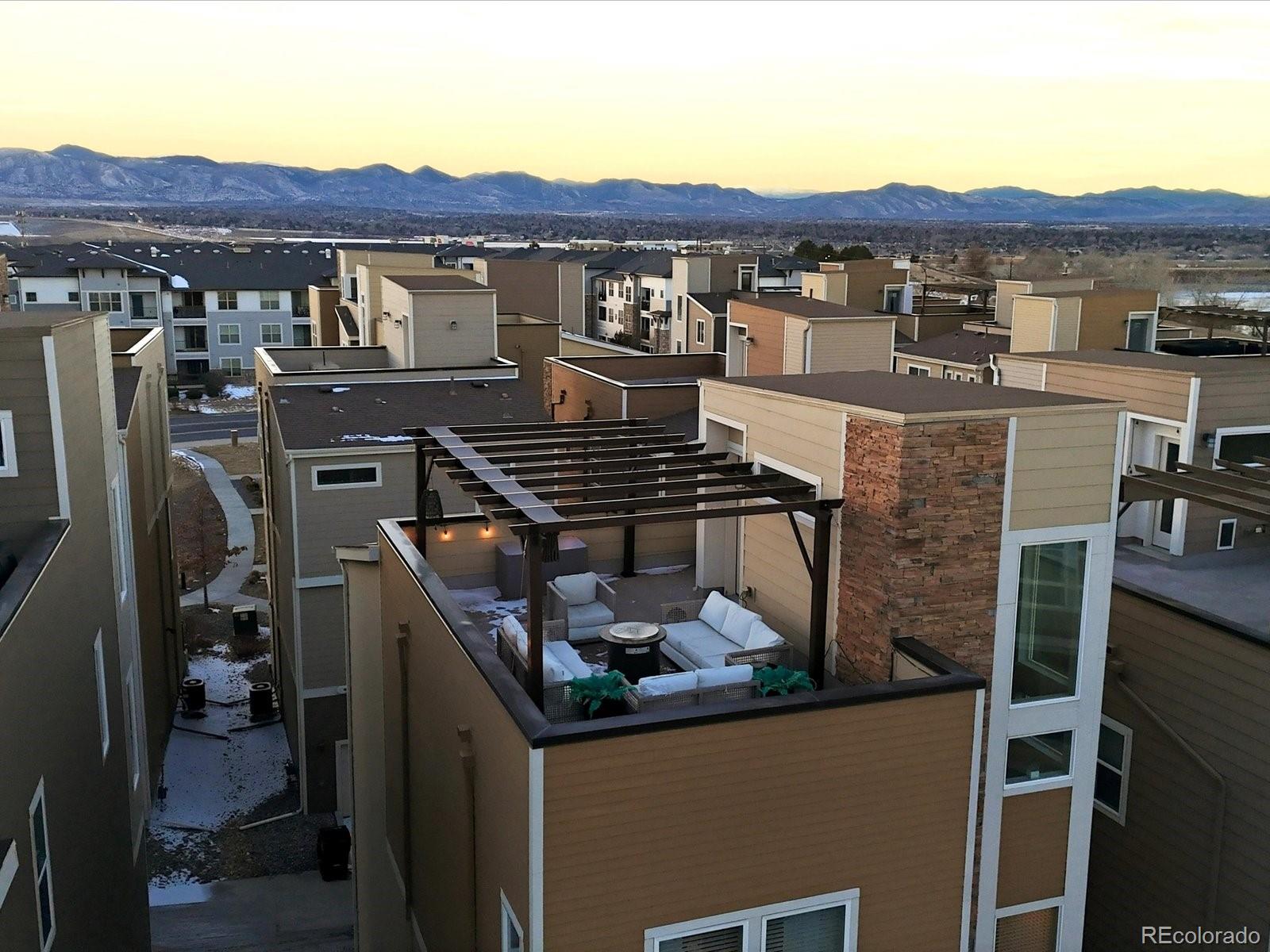 8338 Rivulet Point Highlands Ranch, CO 80129 - Photo 50 of 50 a view of a chairs and table in a terrace