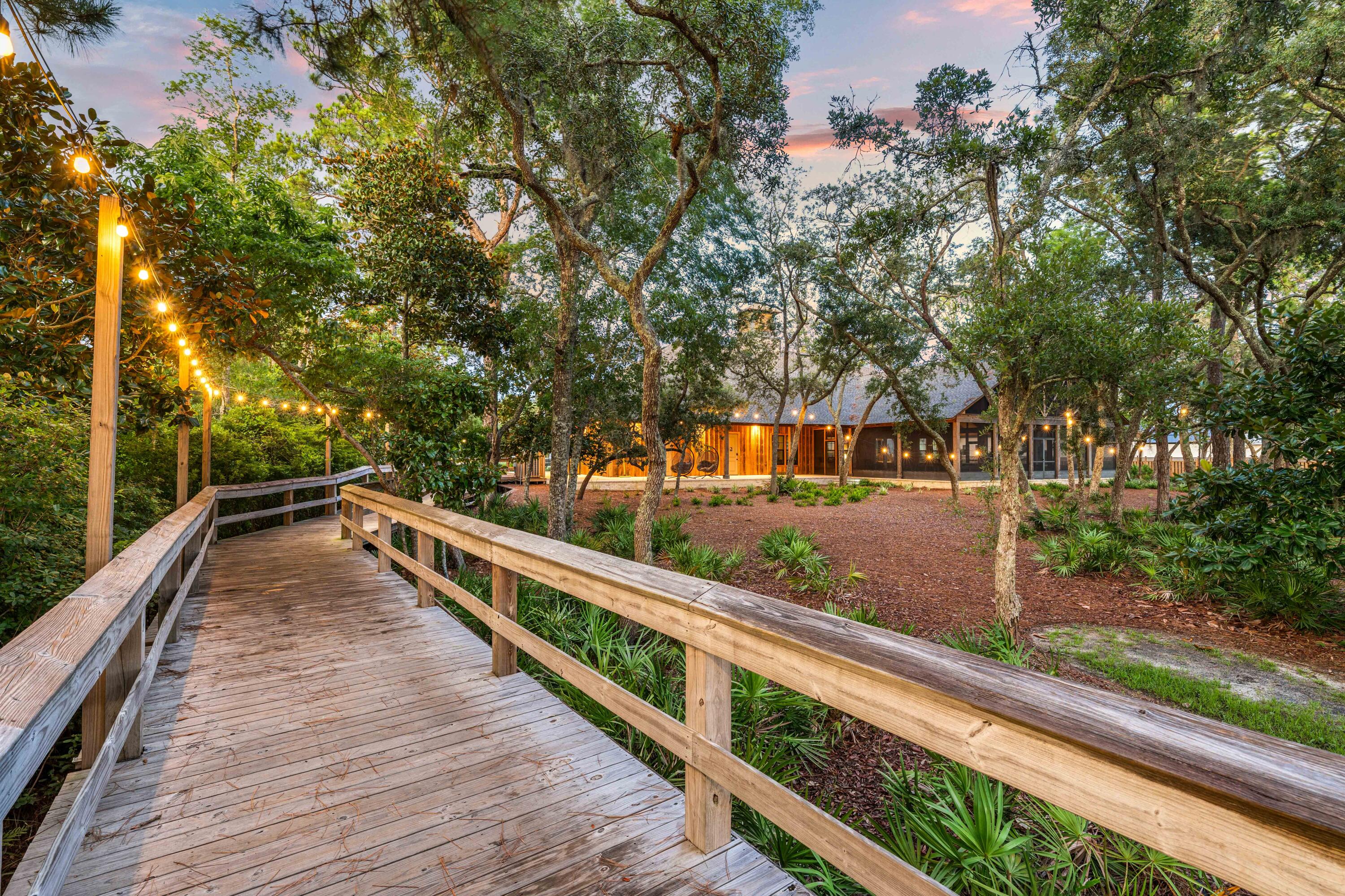 112 East Captain Fritz Way Freeport, FL 32439 - Photo 20 of 58 a view of balcony and trees