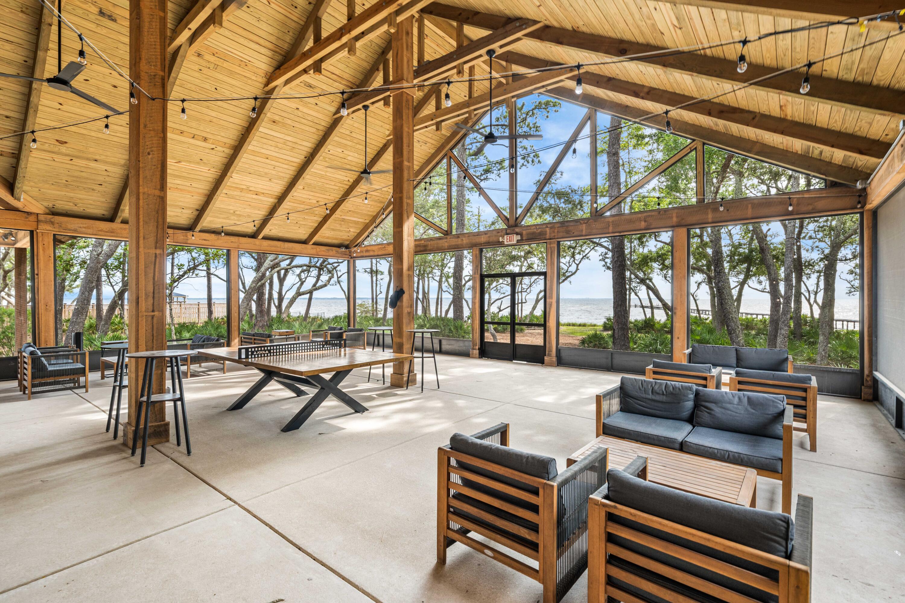 112 East Captain Fritz Way Freeport, FL 32439 - Photo 24 of 58 a building outdoor space with patio furniture and a patio