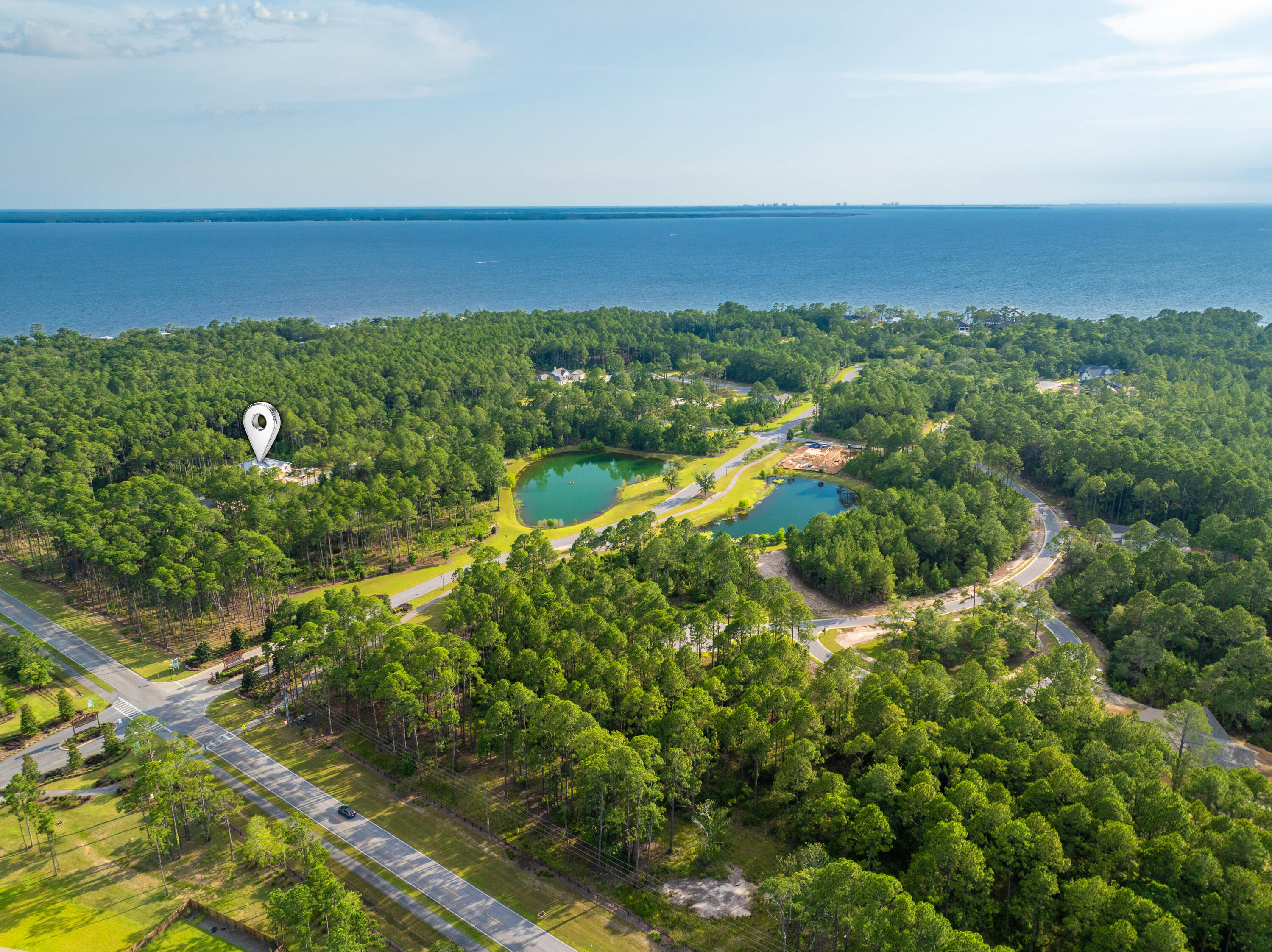 112 East Captain Fritz Way Freeport, FL 32439 - Photo 8 of 58 a view of a city with an ocean