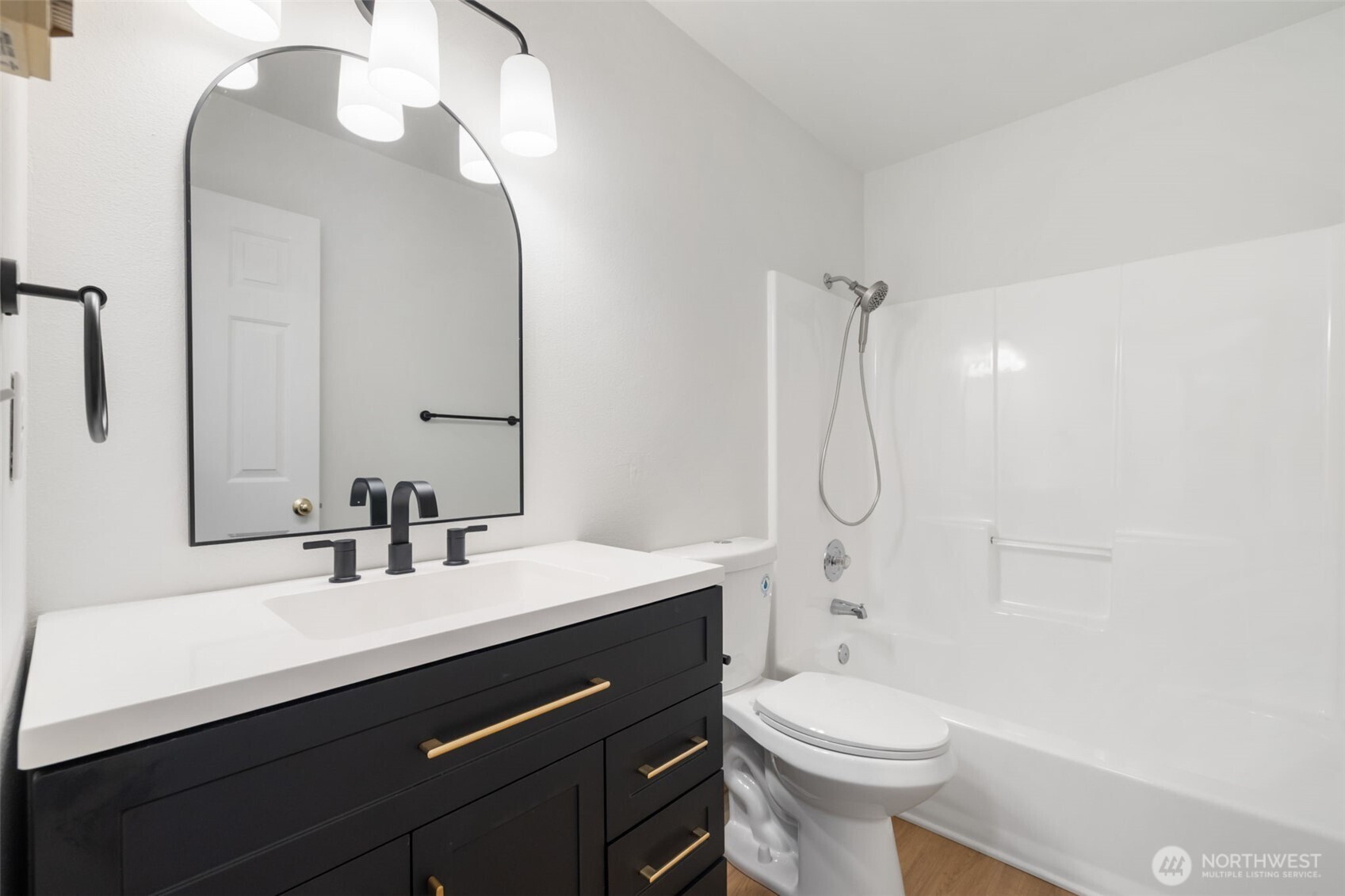 3560 Courtyard Lane Bremerton, WA 98310 - Photo 20 of 26 a bathroom with a sink a toilet and shower