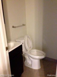 1330 Delta Road Walled Lake, MI 48390 - Photo 8 of 12 Half bath off fam rm