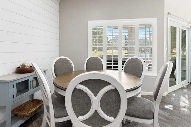 a kitchen with a stove a sink and a microwave