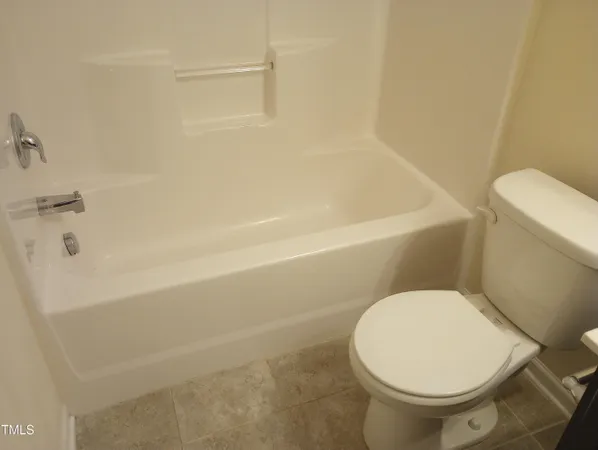 a view of a room that has a window