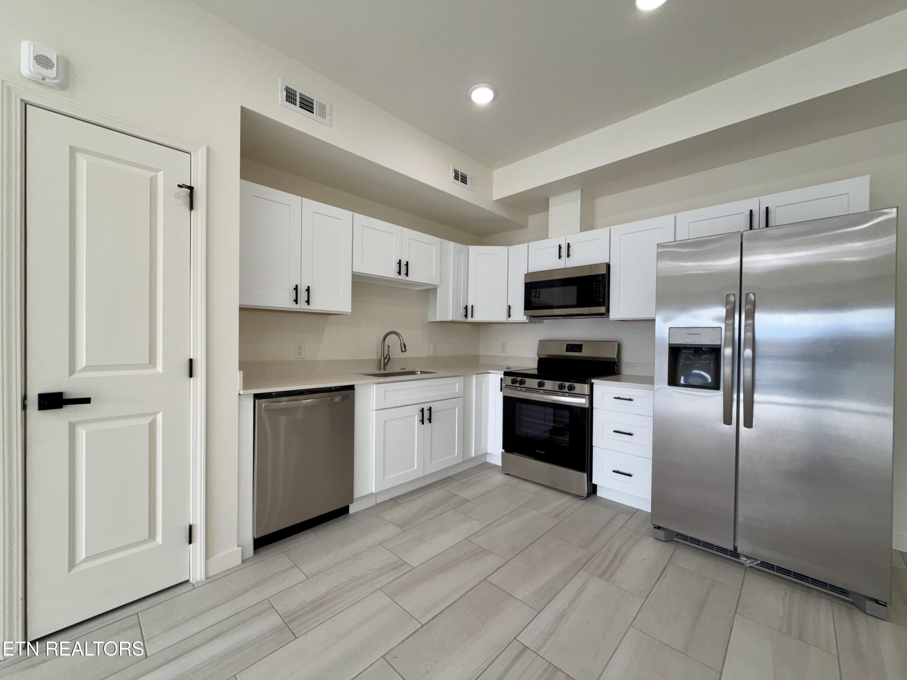 129 Sugarfoot Way, Unit 301 Pigeon Forge, TN 37863 - Photo 1 of 11 IMG_9819