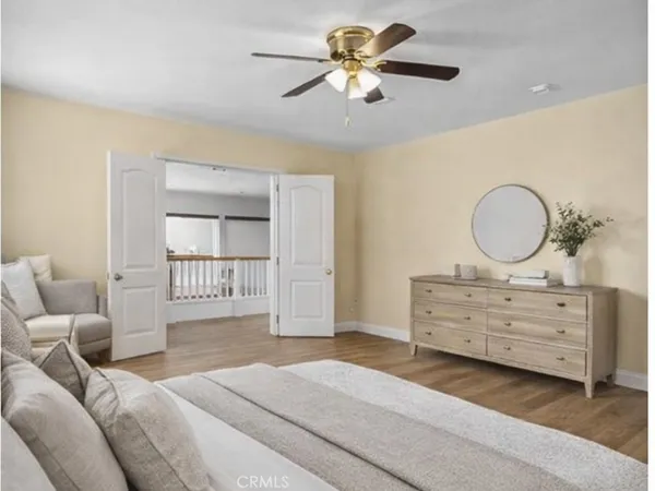 a spacious bathroom with a large tub and shower