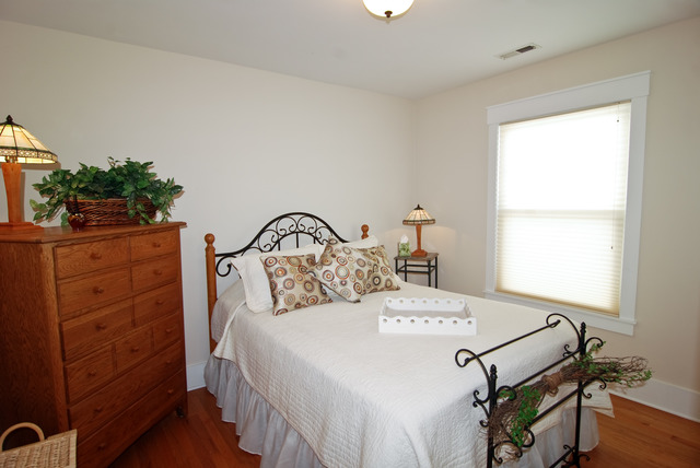 265 East Quincy Street Riverside, IL 60546 - Photo 14 of 25 a bedroom with a bed and a dresser