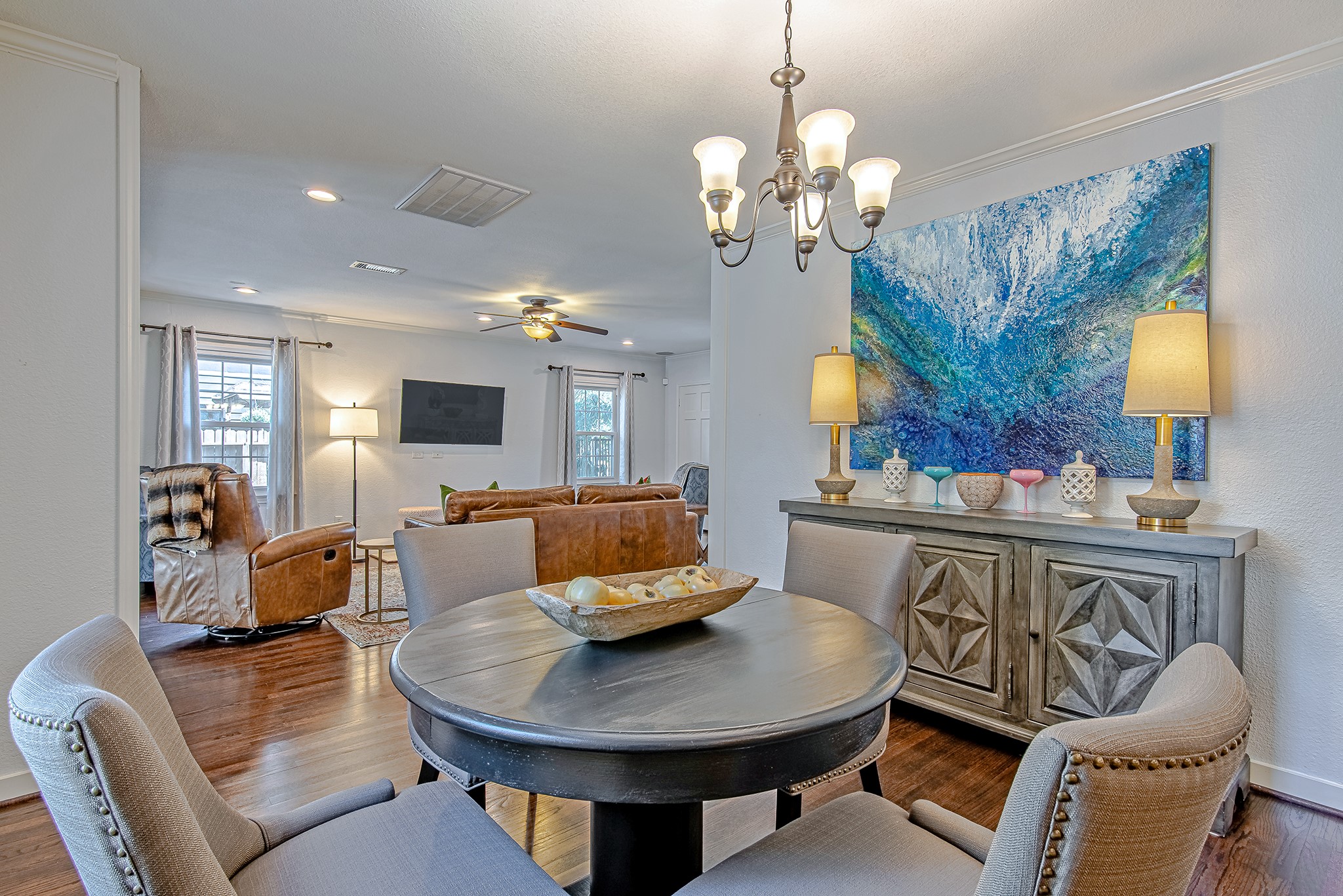 520 West 30th Street Houston, TX 77018 - Photo 10 of 28 This view from the dining area offers a clear line of sight into the spacious living room, creating an open and cohesive living space.